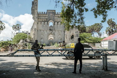 Soldiers on guard in front of the the ruins of the Italian-built Mogadishu cathedral.