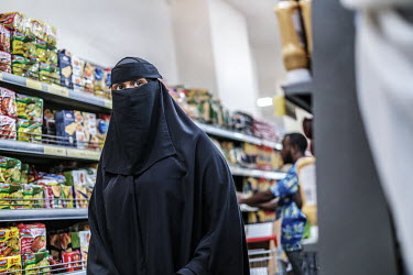 A woman shopping at the Hayat Market supermarket, on one of the newest commercial streets in the Wadajir district.