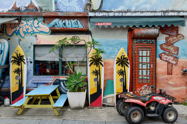 The colourful exterior of a surfshop on the main street parallel to Wushi beach, near Toucheng.