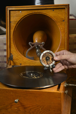 Record collector Dr Hsu Deng-fang positions a saphire-point stylus onto a rare hand-engraved record part of his large collection of records and associated memorabilia.