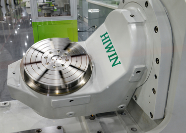 A Torque Motor Rotary Table, displayed in the Hiwin Corp. showroom. Hiwin Corp. is Taiwan's leading manufacturer of motion control and system technology equipment, increasingly in demand to help stabi...