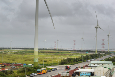 Massive wind turbines, viewed from the rooftop of the Taipower Company's Chang-Yi Switching Station, on Taiwan's windswept west coast.