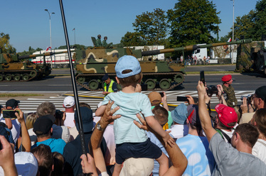 Polish-made Krab howitzers roll by a large crowd who have came to watch the largest military parade ever held in post-communist Poland. The event involved 2,000 soldiers and 200 pieces of military equ...