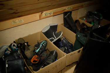 Footwear in a storage room at the home, near the Belarus border, of family of activists who help illegal migrants crossing the frontier.