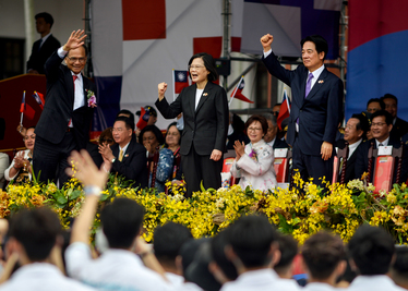 President Tsai Ing-wen (left) and her Vice President William Lai (right) show their appreciation of some of Taiwan's medal winners from the recent Asian Games (held in China) during Taiwan's 112th Nat...