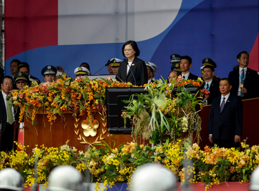 Taiwan's President Tsai Ing-wen at the podium for Taiwan's 112th National Day parade, her last time in this role, as the two-term president will be stepping down come the general election in January 2...