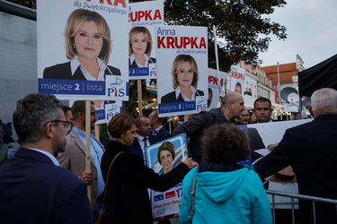 Anna Paluch (centre) a parliamentary candidate for the PiS (Law and Justice) party waits to enter the area where a PiS party rally is taking place prior to the 15 October 2023 parliamentary elections.